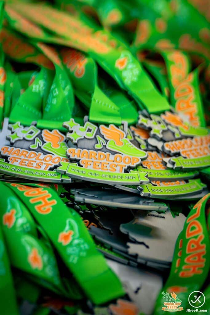 Stapel groene Hardloopfeest-medailles
